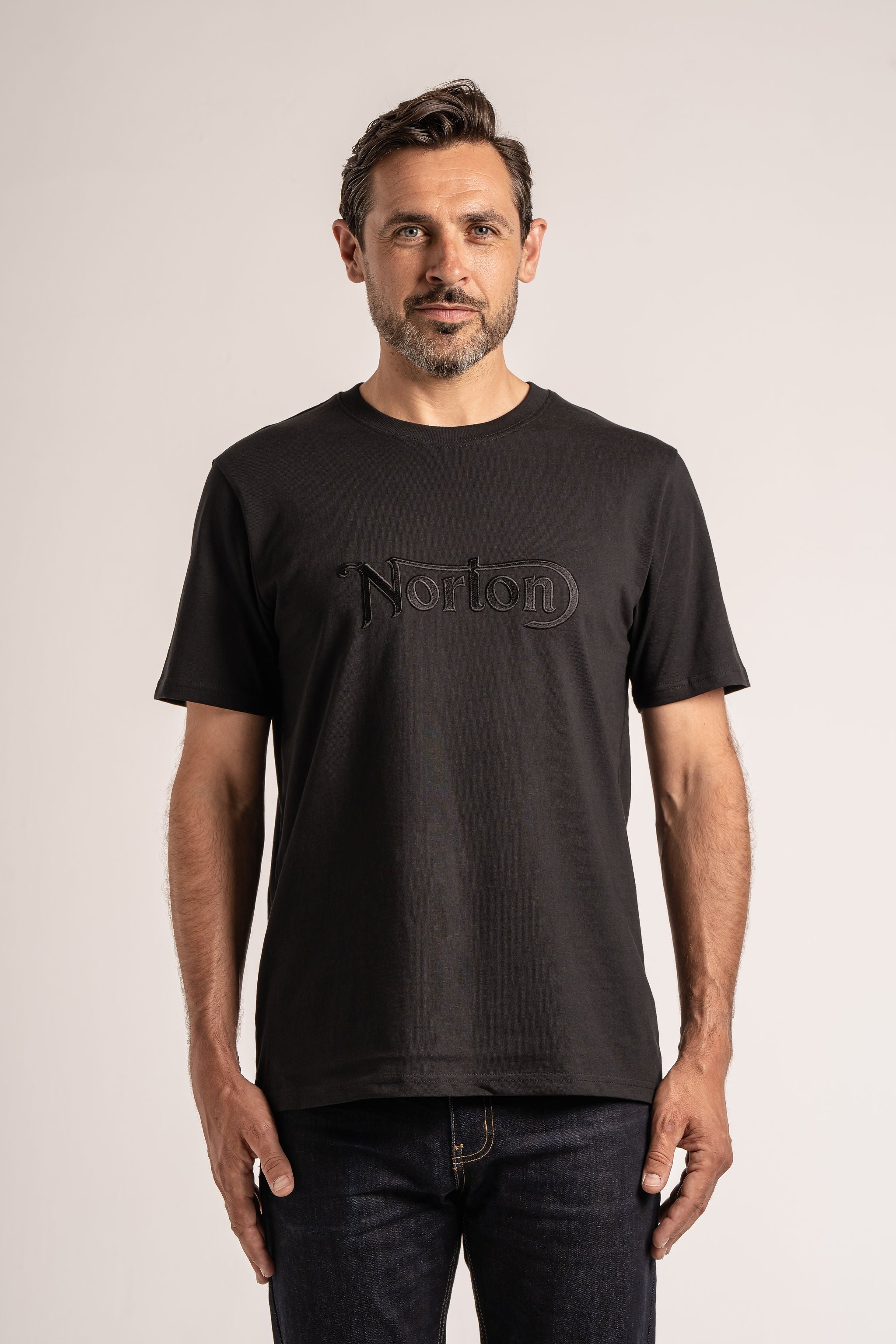 Short Sleeve Black Tee With Large Embroidered Black Logo - Unisex