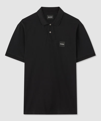 Polo nero in cotone con badge Norton ricamato