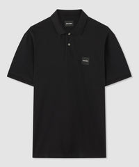 Polo nero in cotone con badge Norton ricamato